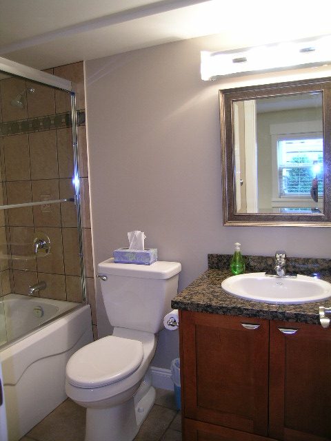 B - 335 East 22nd Street - Suite in House - Lonsdale - Photo 9 of 10