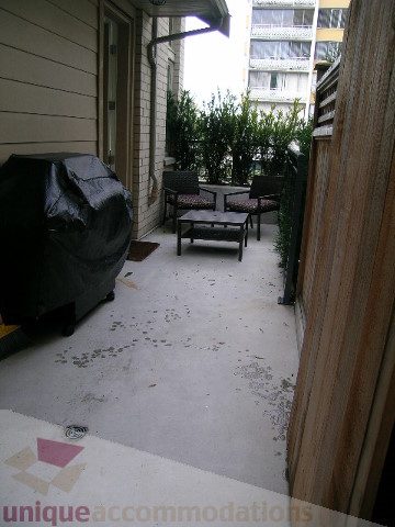 Furnished patio with grill, outdoor furniture, and wooden fencing. - 1381 Bute Street, Vancouver Downtown