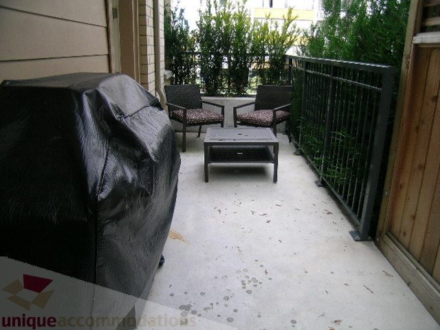Furnished patio with outdoor furniture and grill cover. - 1381 Bute Street, Vancouver Downtown