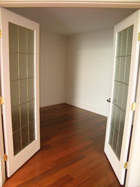 Bright den with hardwood floors and frosted glass doors. - 602 - 3355 Cypress Place, West Vancouver