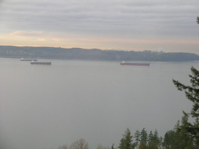 Bright living room with a stunning city view and large windows. - 602 - 3355 Cypress Place, West Vancouver