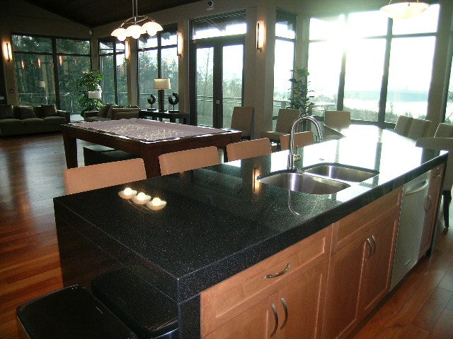 Bright kitchen with granite countertops, hardwood floors, and a city view. - 602 - 3355 Cypress Place, West Vancouver