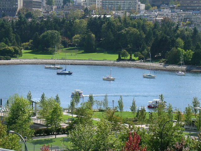 Furnished living room with city view and waterfront access. - 508 - 1408 Strathmore Mews, Vancouver Downtown