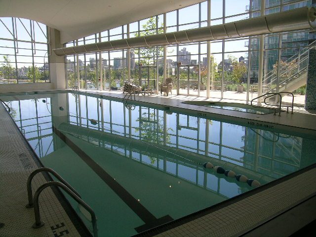 Spacious indoor pool with city view and modern design. - 508 - 1408 Strathmore Mews, Vancouver Downtown