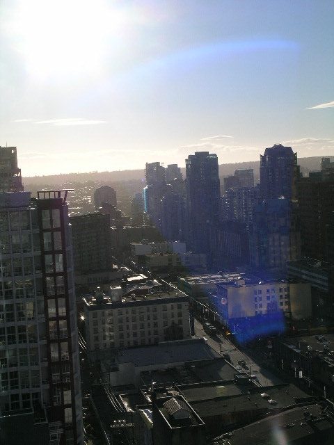 Spacious 1-bedroom condo with stunning city view, featuring modern furnishings and a balcony. - 2307 - 833 Seymour Street, Vancouver Downtown