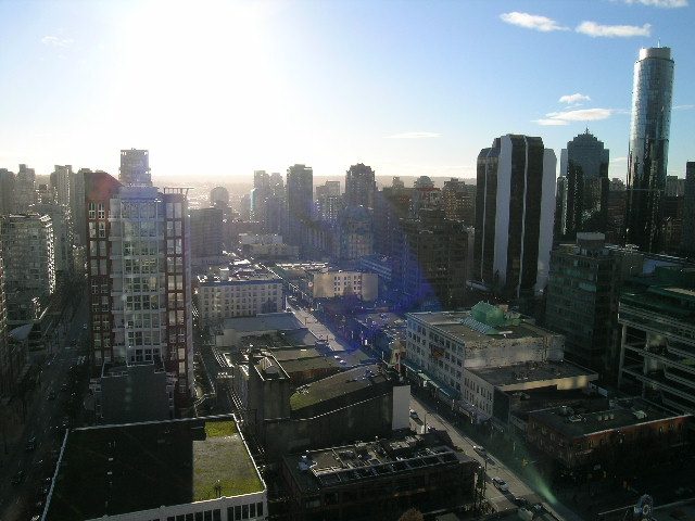 Spacious 1-bedroom condo with stunning city view, featuring modern furnishings and large windows. - 2307 - 833 Seymour Street, Vancouver Downtown