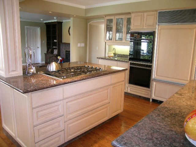 Bright kitchen with granite countertops, hardwood floors, and a view of the city. - 1875 26th Street, West Vancouver