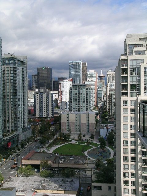 Spacious 2-bedroom condo with stunning city view, featuring modern furnishings and large windows. - 2109 - 1295 Richards Street, Vancouver Downtown