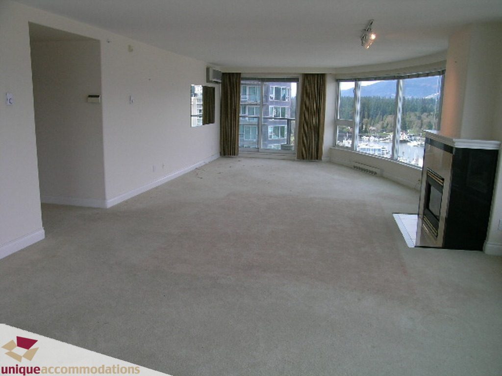 Spacious living room with a stunning city view and large windows. - 1903 - 535 Nicola Street, Vancouver Downtown