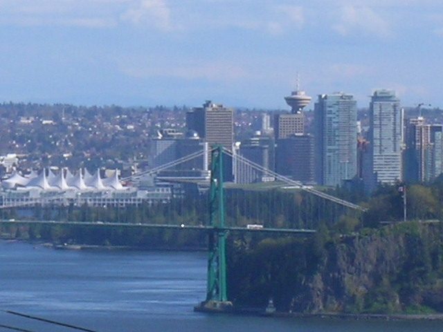 Bright living room with a stunning city view and modern furnishings. - 1965 22nd Street, West Vancouver