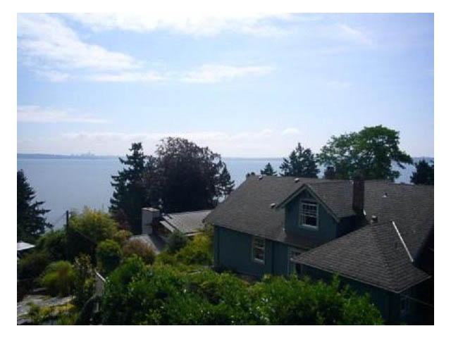 Spacious 3-bedroom house with a stunning ocean view and lush greenery. - 4750 The Highway, West Vancouver