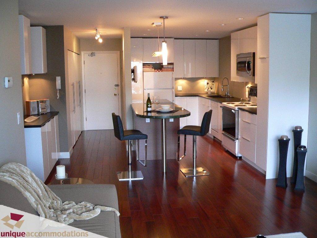 Furnished 2-bedroom condo with hardwood floors and modern kitchen counter. - 203 - 1066 W 13th Ave, Vancouver West Side