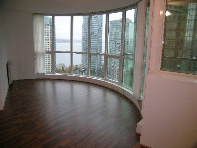 Bright living room with hardwood floors and a stunning city view. - 2006 - 588 Broughton St, Vancouver Downtown
