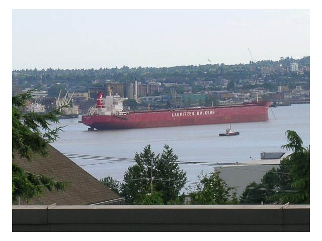 Bright living room with city view and waterfront access. - 3-220 East 4th Street, North Vancouver