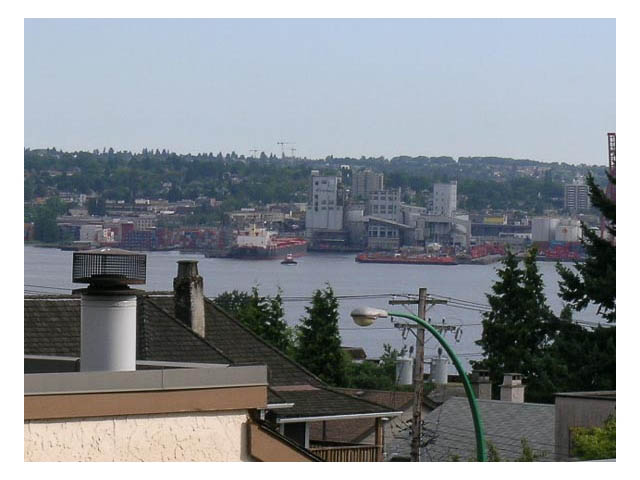 Bright living room with city view and waterfront access. - 3-220 East 4th Street, North Vancouver