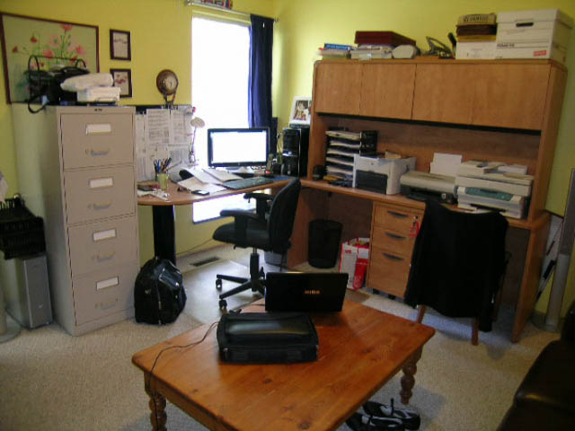 Office with wooden desk, computer, filing cabinet, and printer. - 1077 Blue Grouse Way, North Vancouver
