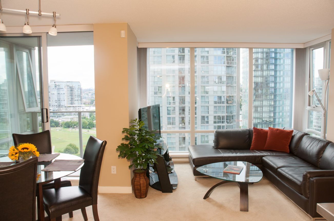 Furnished living room with city view and modern furniture. - 1708 - 1438 Richards Street, Vancouver Downtown