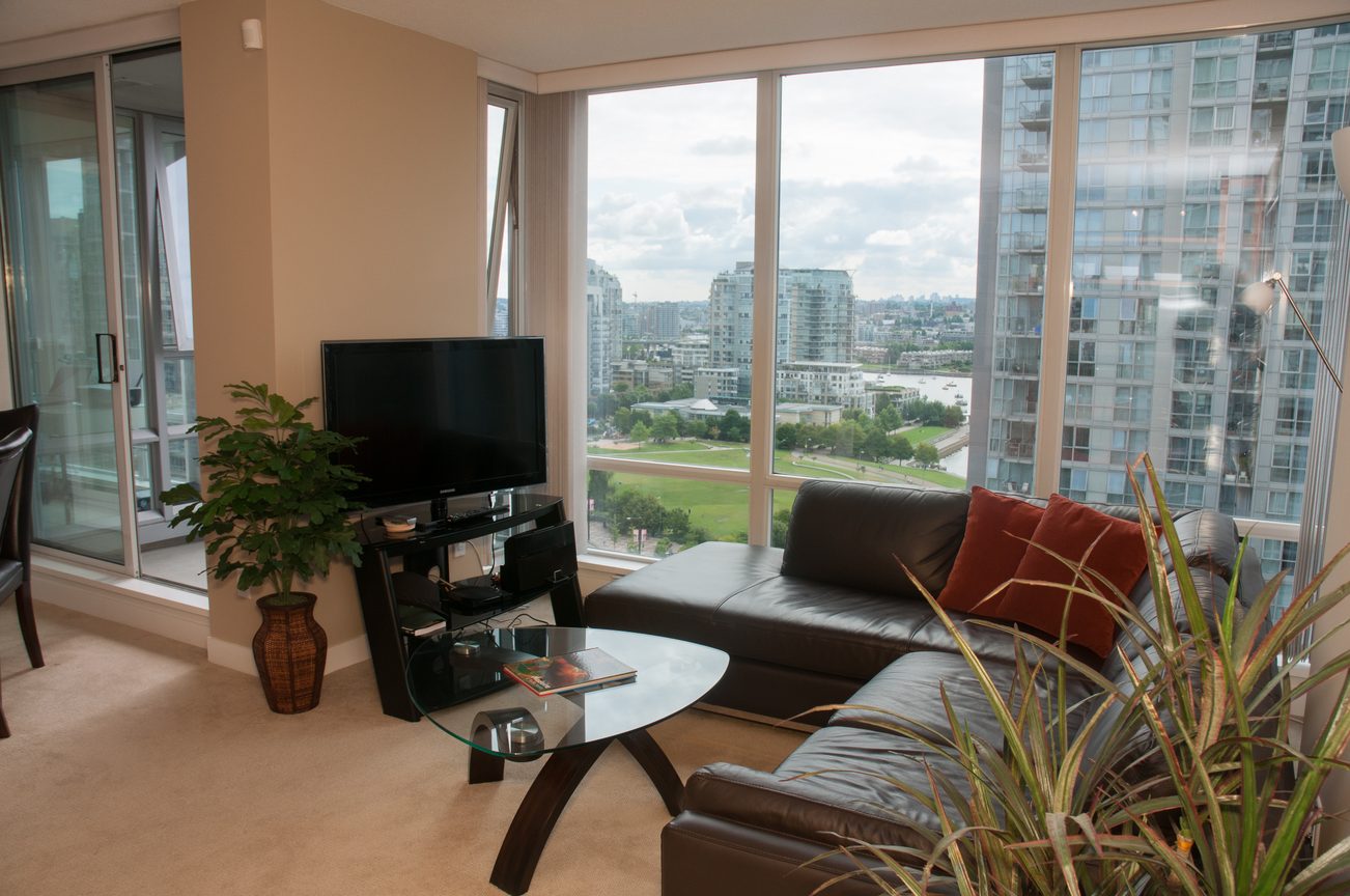 Bright living room with city view and modern furniture. - 1708 - 1438 Richards Street, Vancouver Downtown