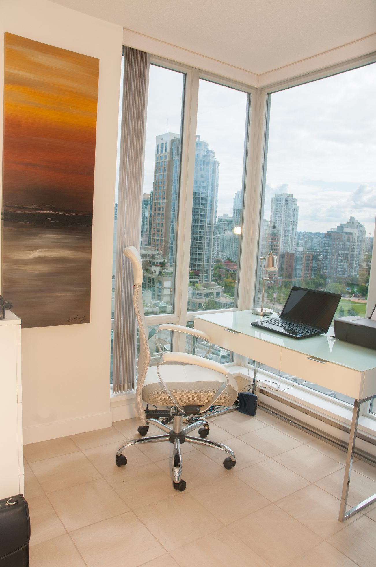 Bright office with city view, modern desk, and rolling chair. - 1708 - 1438 Richards Street, Vancouver Downtown