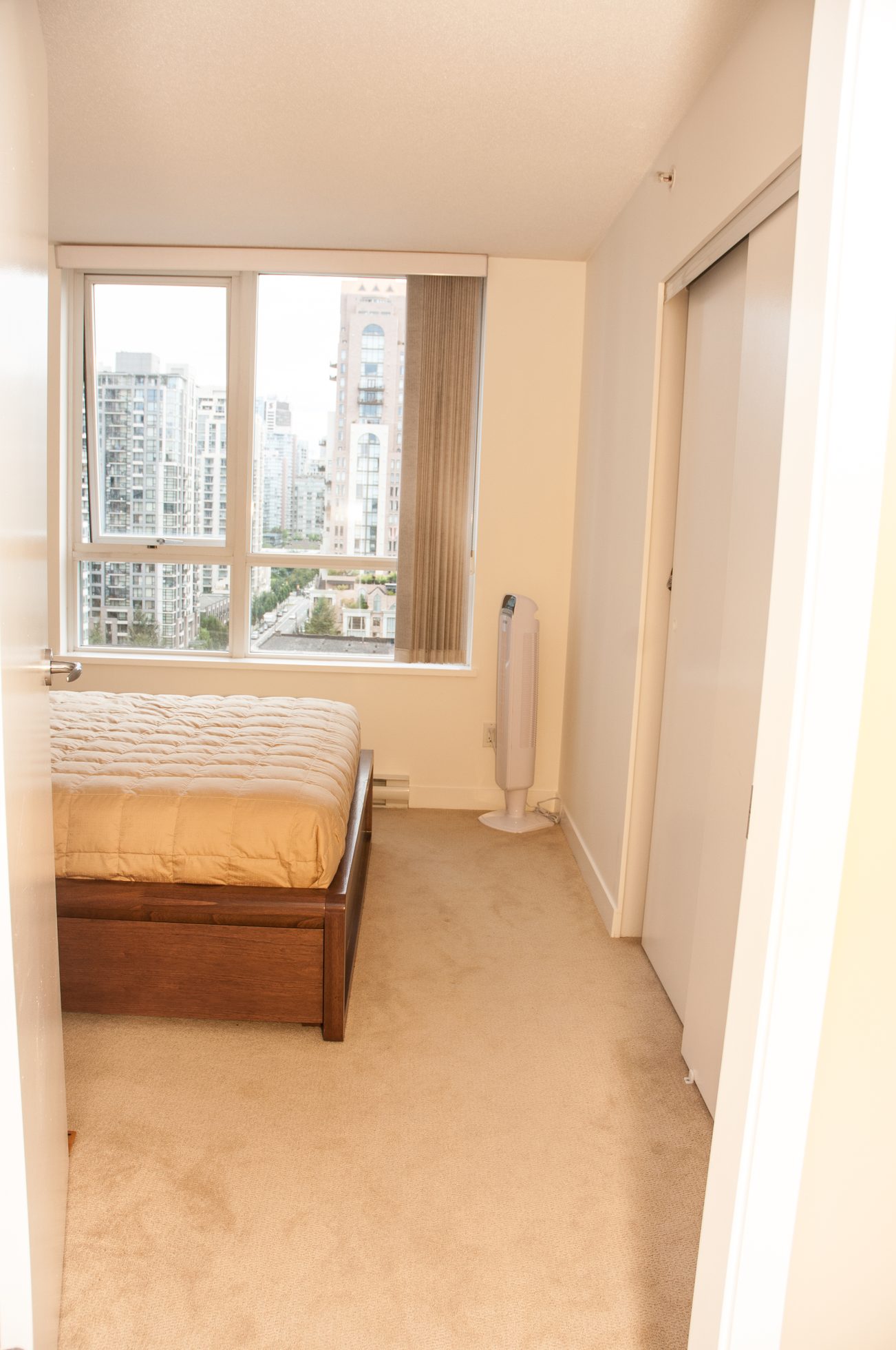 Furnished 1-bedroom + den with city view and wooden bed frame. - 1708 - 1438 Richards Street, Vancouver Downtown
