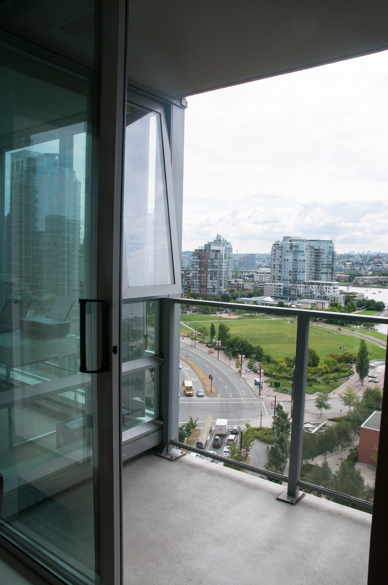 Furnished balcony with city view and modern windows. - 1708 - 1438 Richards Street, Vancouver Downtown