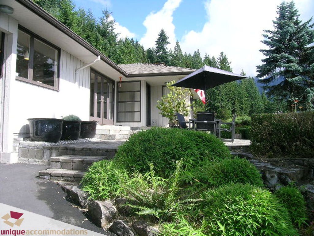 Furnished 3-bedroom house with stone steps and lush greenery. - 68 Bonnymuir Drive, West Vancouver