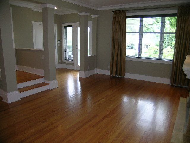 Bright living room with hardwood floors and large windows. - 3670 Point Grey Road, Vancouver West Side