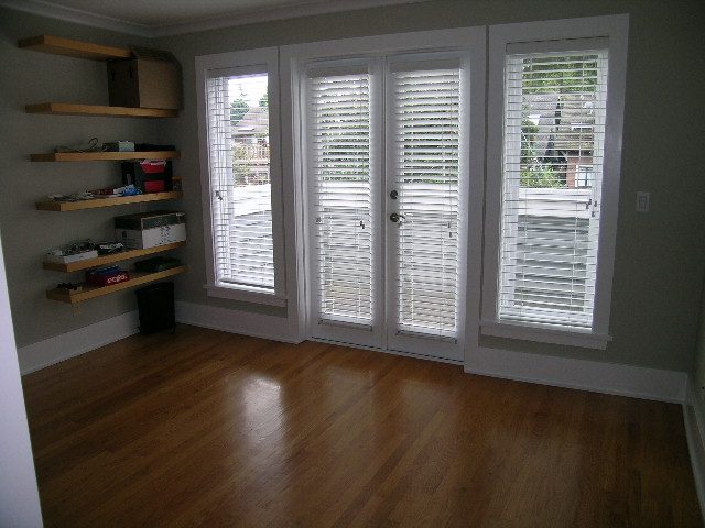 Bright living room with hardwood floors and built-in shelves. - 3670 Point Grey Road, Vancouver West Side