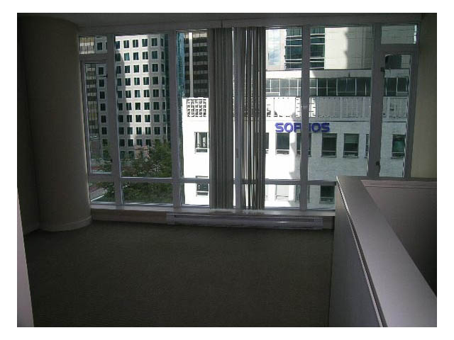 Bright living room with city view and modern furnishings. - 614 - 610 Granville St, Vancouver Downtown