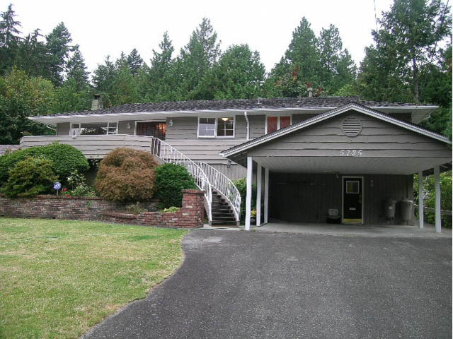 Furnished 3-bedroom house with a covered porch and a landscaped front yard. - 5725 Cranley Drive, West Vancouver