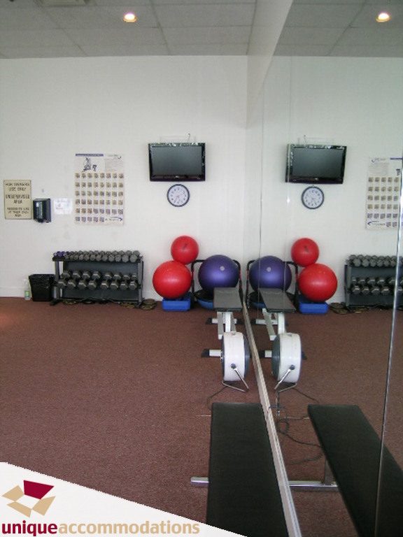 Fitness room with exercise balls, weights, and mirrors. - 902 - 1625 Hornby Street, Vancouver Downtown