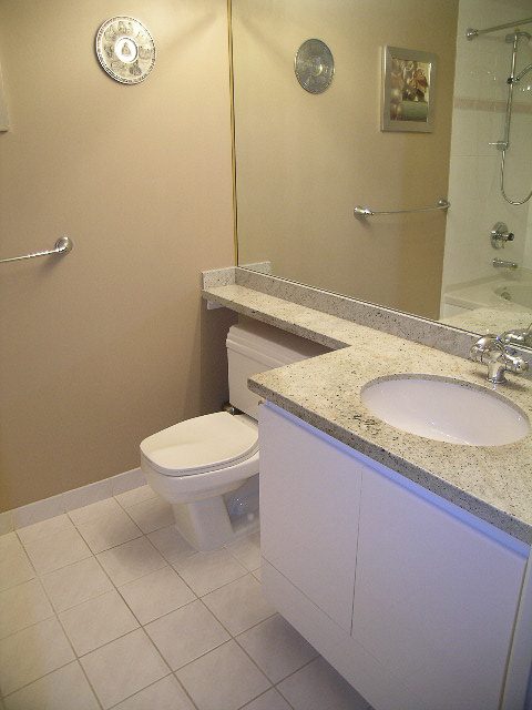 Bathroom with granite countertops and modern fixtures. - 1701 - 867 Hamilton Street, Vancouver Downtown