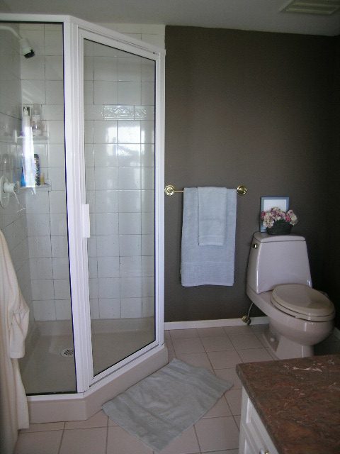 Bathroom with granite countertop and glass shower door. - 1332 Camridge Place, West Vancouver