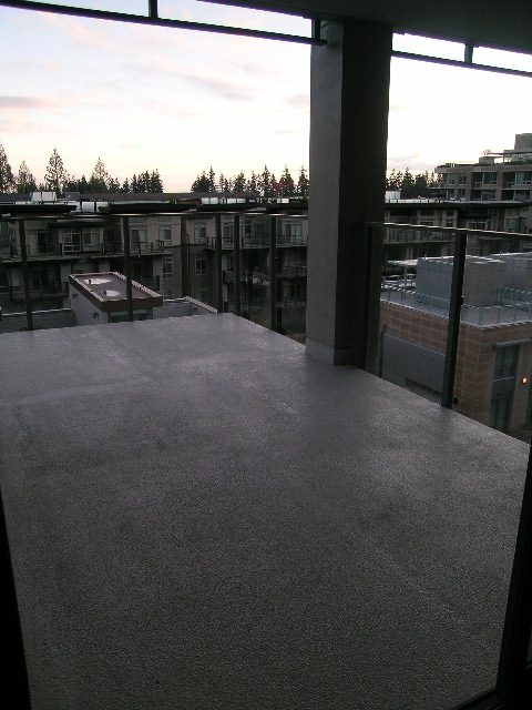 Spacious balcony with city view and modern design. - 602 - 5782 Berton Avenue, Vancouver West Side