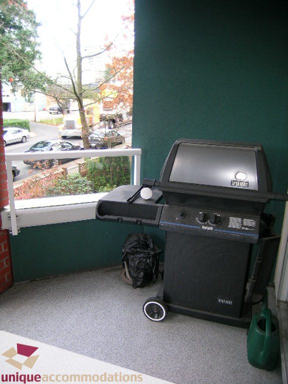 Bright balcony with grill and city view. - 208 - 128 West 8th Street, North Vancouver