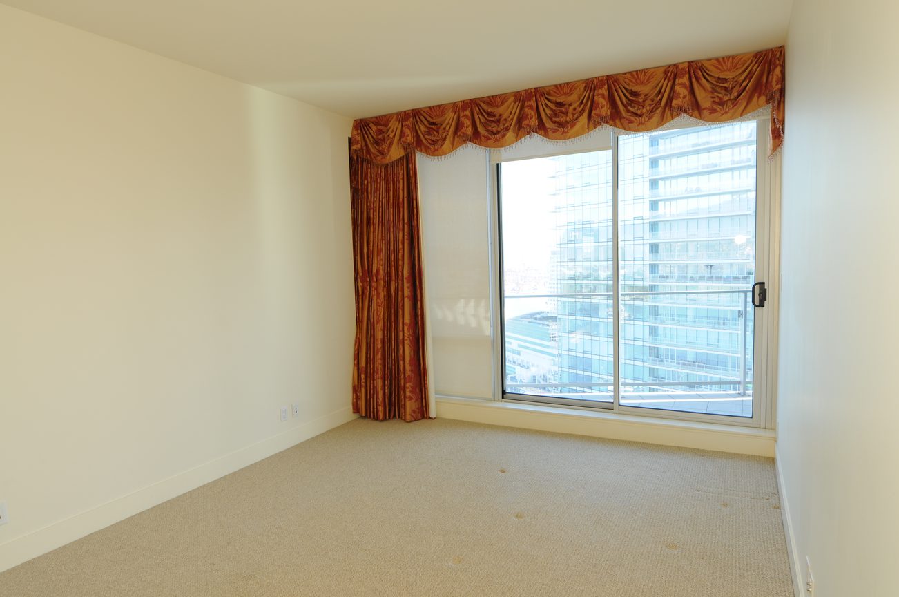 Bright den with bay window, city view, and elegant curtains. - 2304 - 1077 West Cordova St, Vancouver Downtown