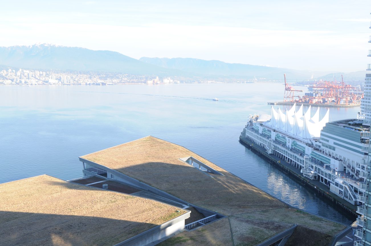 Bright living room with stunning city view and waterfront access. - 2304 - 1077 West Cordova St, Vancouver Downtown