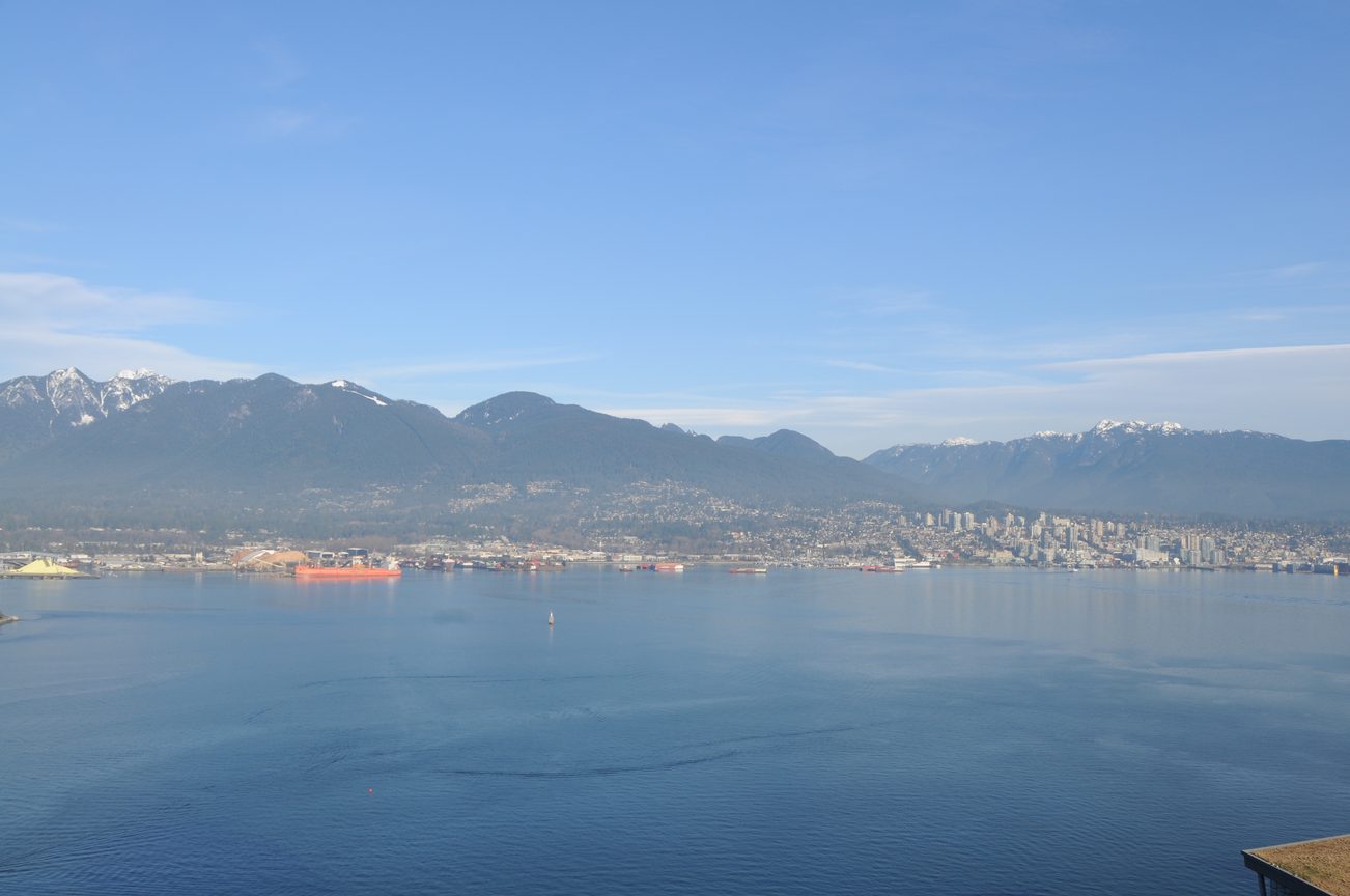 Bright living room with stunning city and mountain view. - 2304 - 1077 West Cordova St, Vancouver Downtown