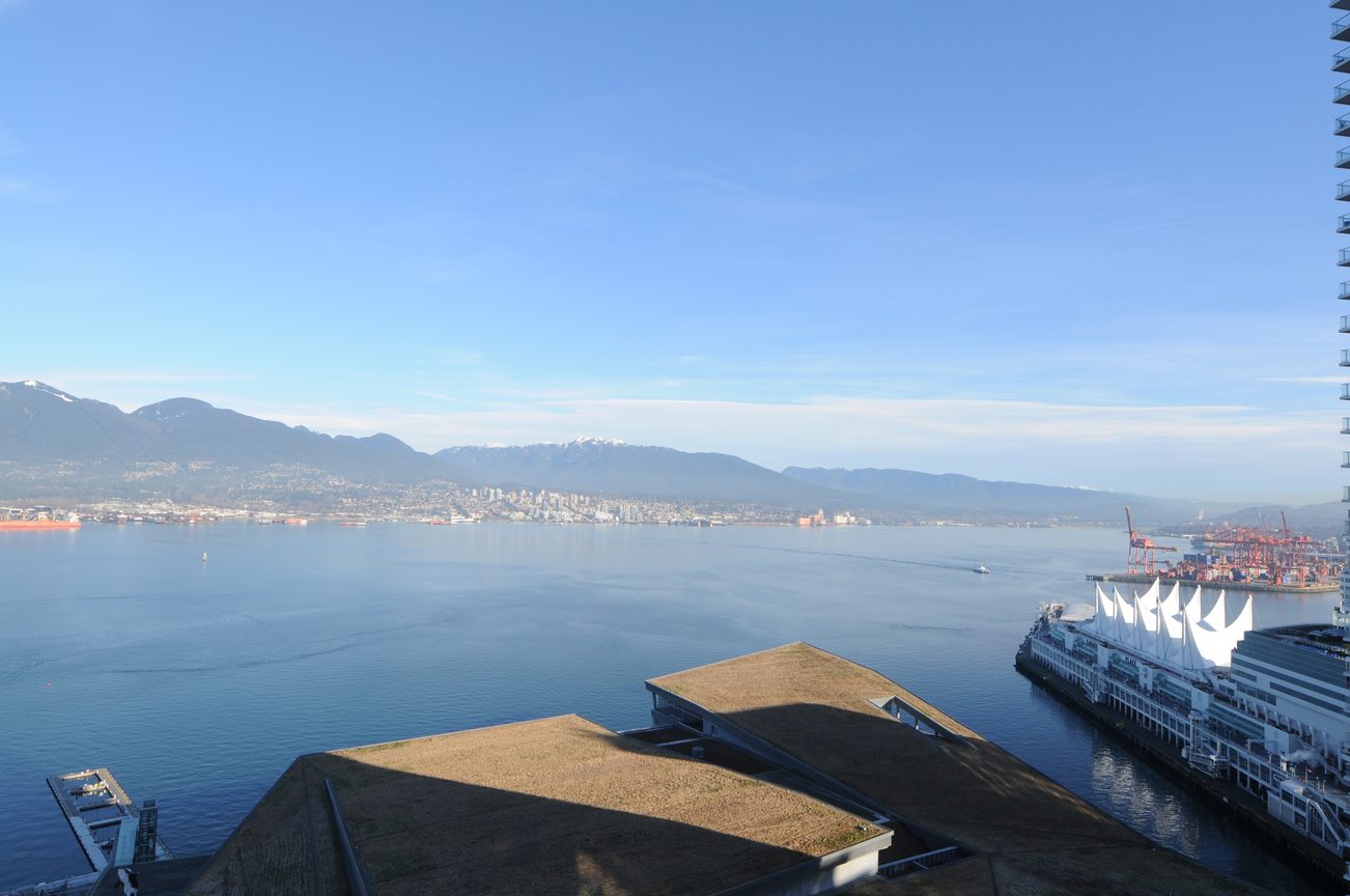 Bright living room with stunning city view and waterfront access. - 2304 - 1077 West Cordova St, Vancouver Downtown