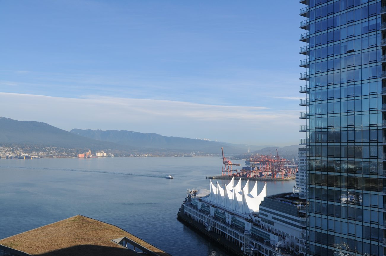 Bright living room with stunning city view and modern furnishings. - 2304 - 1077 West Cordova St, Vancouver Downtown