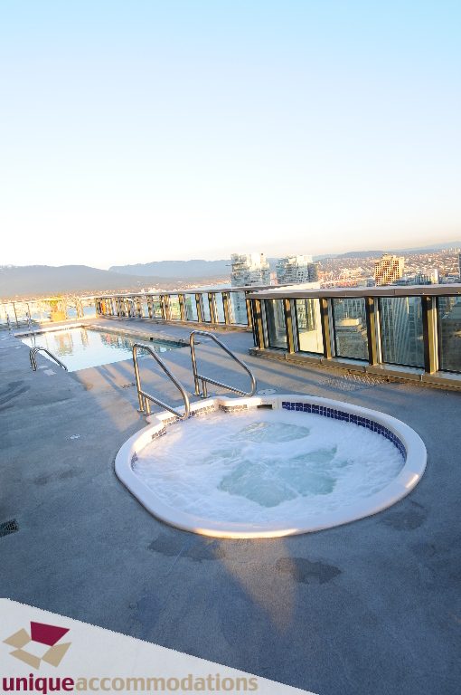 Spacious rooftop terrace with hot tub and city view. - 1802 - 1189 Melville Street, Vancouver Downtown