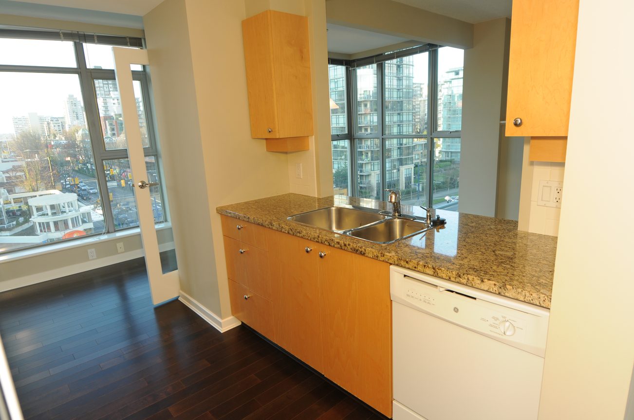 Bright kitchen with granite countertops, hardwood floors, and a city view. - 604 - 1790 Bayshore Drive, Vancouver Downtown