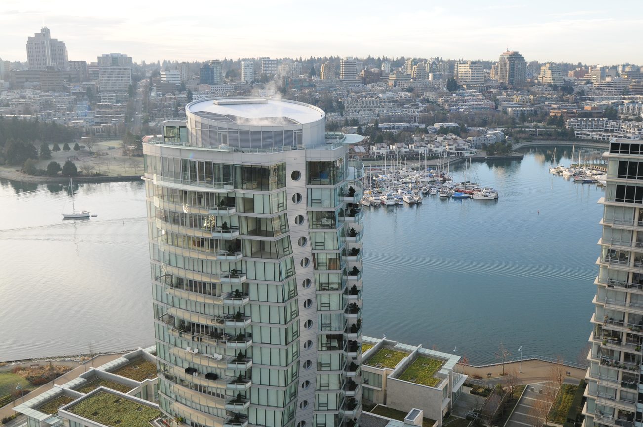 Bright living room with stunning city view and modern furnishings. - 2603 - 1483 Homer Street, Vancouver Downtown