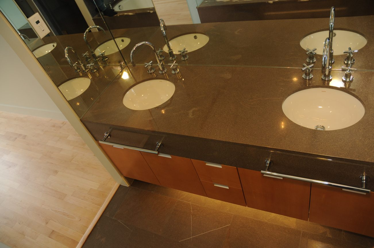 Modern bathroom with sleek countertop and polished sinks. - 3103 - 1077 West Cordova, Vancouver Downtown