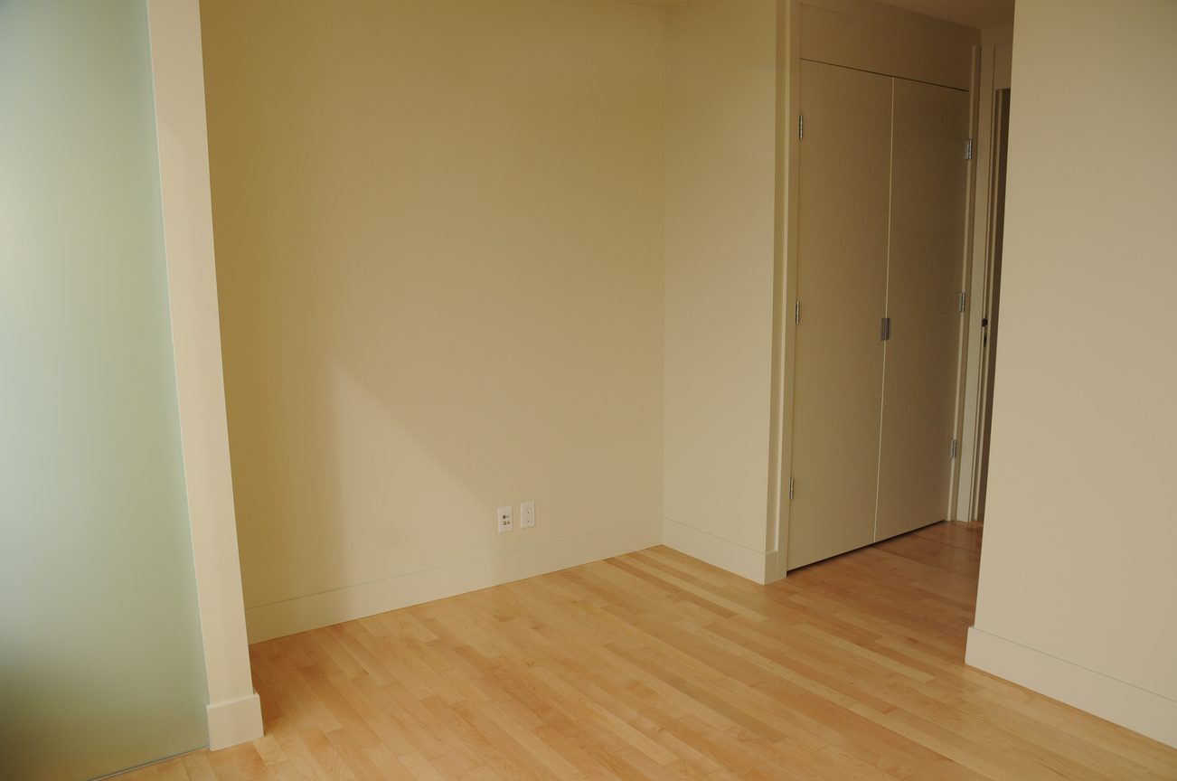 Bright living room with hardwood floors and built-in closet. - 3103 - 1077 West Cordova, Vancouver Downtown