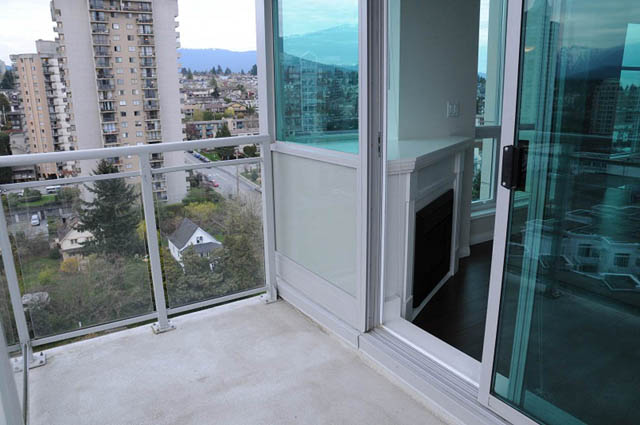 Bright balcony with city view and sliding glass doors. - 1808 - 188 East Esplanade, North Vancouver