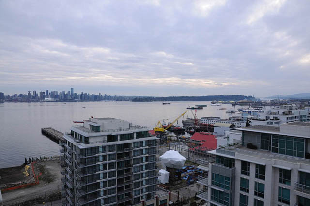 Bright living room with stunning city view and waterfront access. - 1808 - 188 East Esplanade, North Vancouver