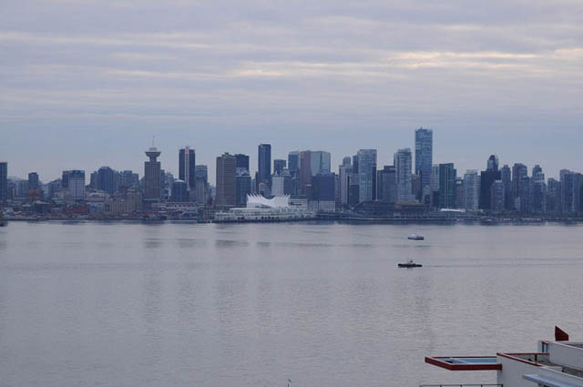 Spacious living room with panoramic city view and waterfront access. - 1808 - 188 East Esplanade, North Vancouver