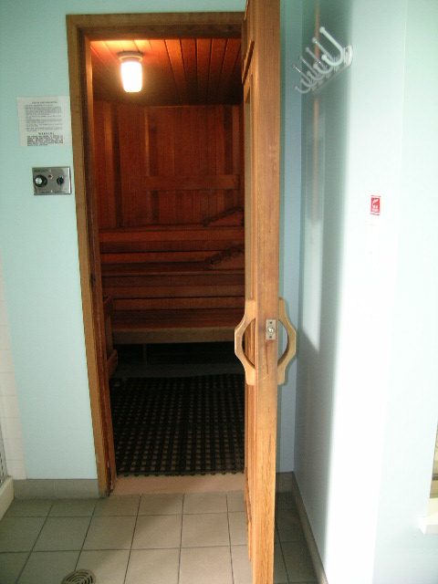 Furnished sauna with wooden interior and bench seating. - 1705-867 Hamilton Street, Vancouver Downtown