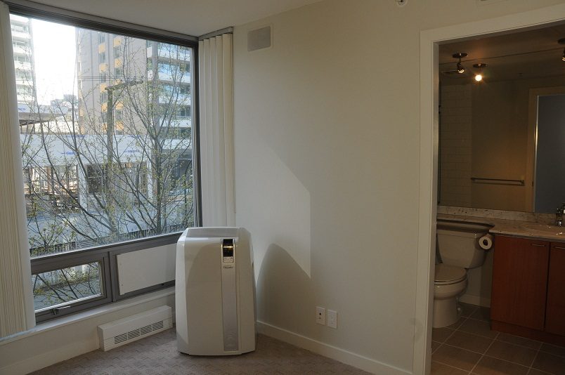 Bathroom with city view and modern fixtures. - 1275 Alberni Street, Vancouver Downtown